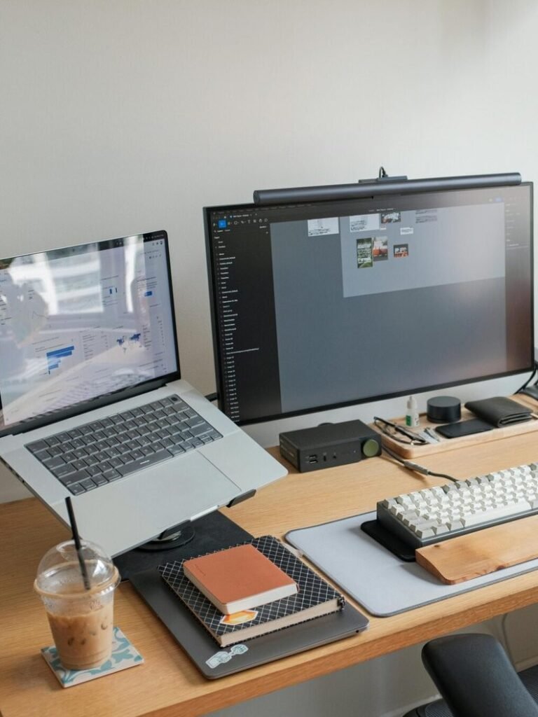 Minimalist small desk setup with laptop and clean cable management