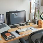 Minimalist small desk setup with laptop and clean cable management