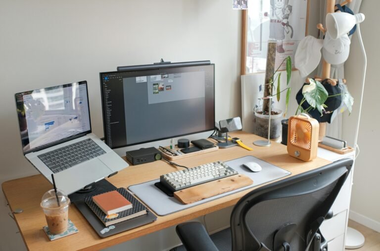 Minimalist small desk setup with laptop and clean cable management